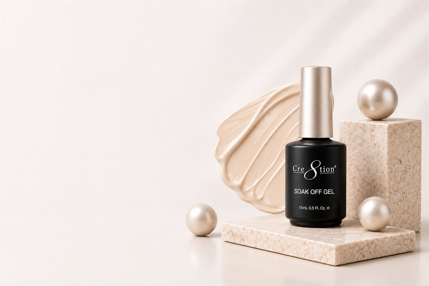 Cre8tion Soak Off Gel with pearls on travertine podiums