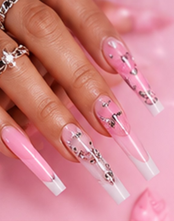 Long pink nails set with crystals