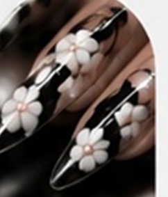 Black nails with white 3D flower art and silver chrome