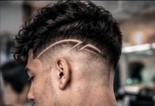 Textured crop with a low fade and a hard part line.
