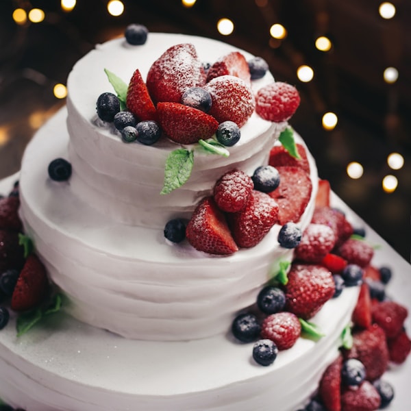 Strawberry shortcake topped with fresh berries
