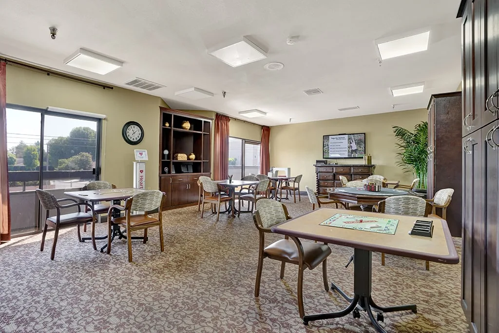 A games table set up beside the windows